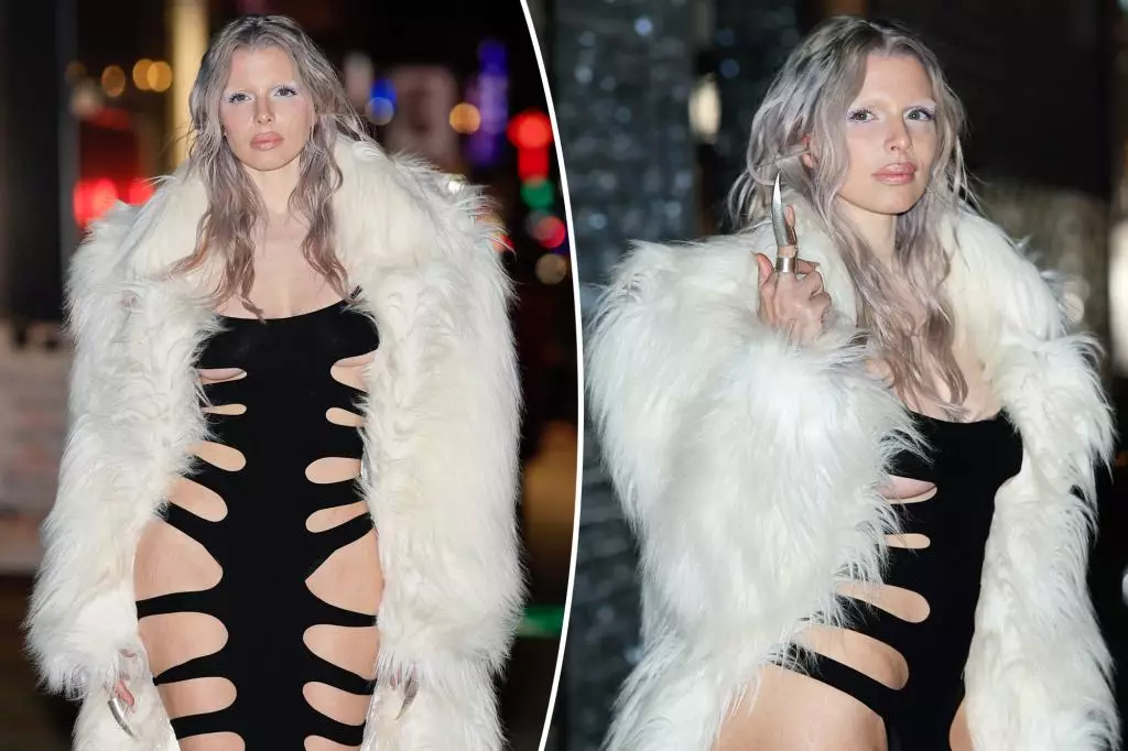 Julia Fox Stuns in Spiderweb-like Dress at NYFW 2024