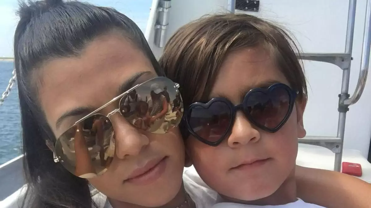 Kourtney Kardashian’s Son Mason Disick Makes Rare Appearance in Khloe’s Video & Shows Off Stylish Look