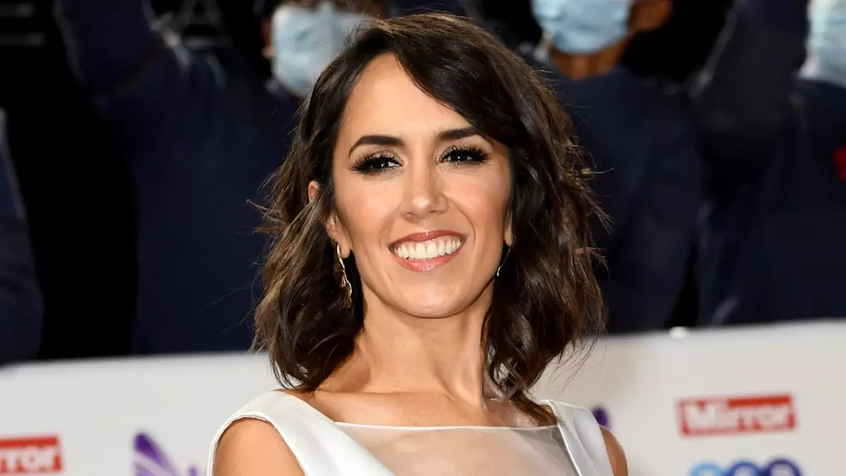 Janette Manrara Shines in Orange Bikini with Daughter Lyra