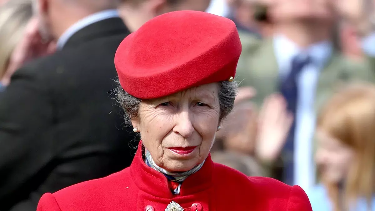 Princess Anne Dazzles in Vibrant Red at Cheltenham Festival